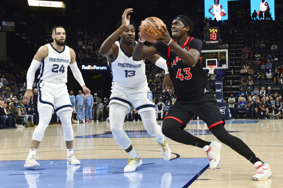 <strong>Toronto Raptors forward Pascal Siakam (43) drives against Memphis Grizzlies forwards Jaren Jackson Jr. (13) and Dillon Brooks (24) in the first half of an NBA basketball game Wednesday, Nov. 24, 2021, in Memphis.</strong> (AP Photo/Brandon Dill)