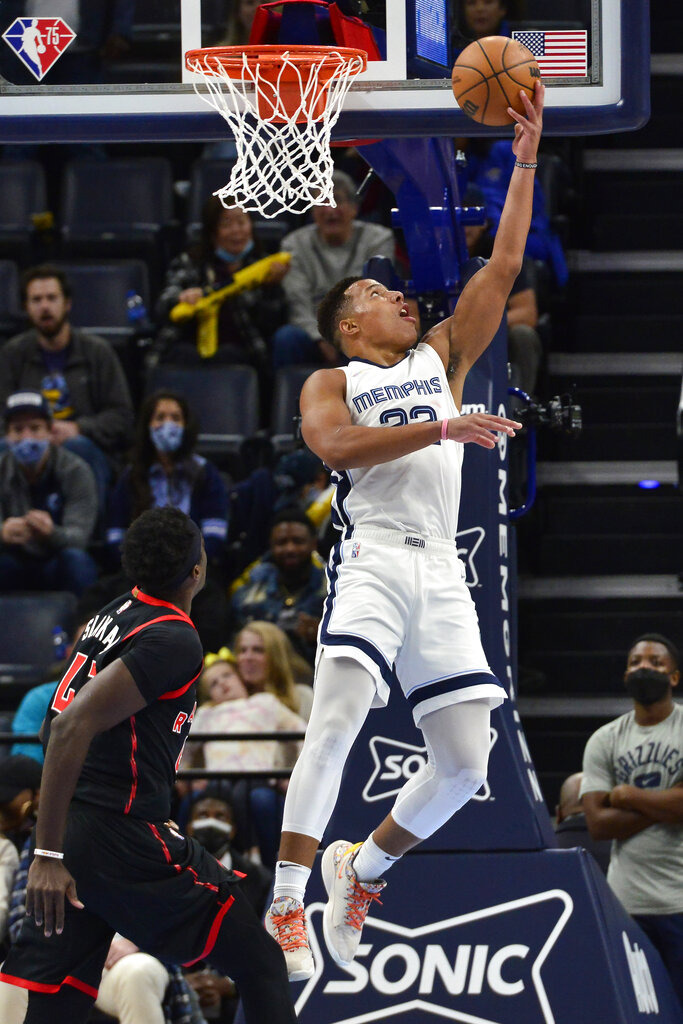 <strong>Memphis Grizzlies guard Desmond Bane (22) shoots ahead of Toronto Raptors forward Pascal Siakam (43) in the first half of an NBA basketball game Wednesday, Nov. 24, 2021, in Memphis.</strong> (AP Photo/Brandon Dill)