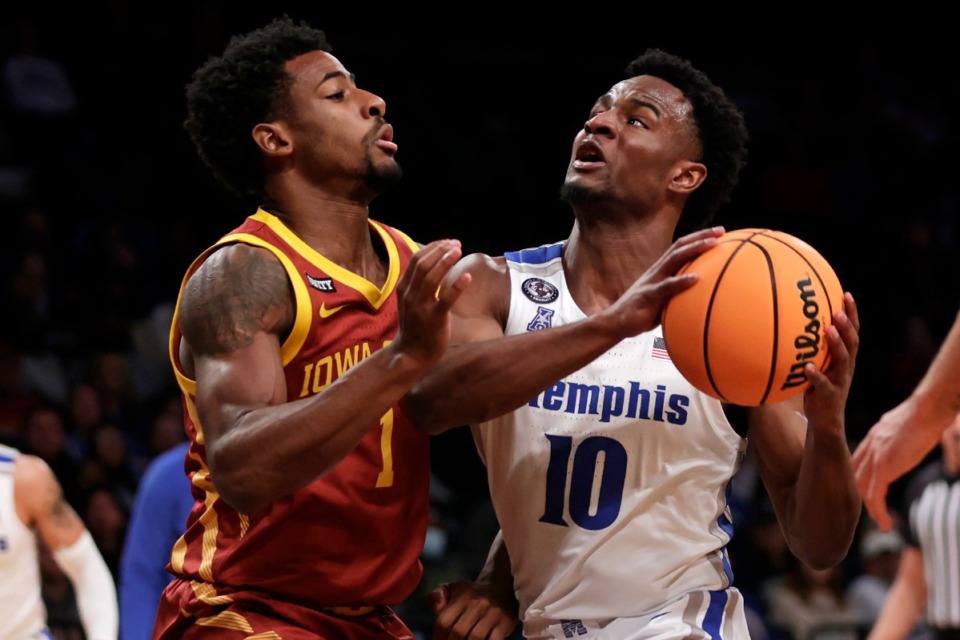 <strong>Memphis' Alex Lomax (10) drives to the basket against Iowa State's Izaiah Brockington during the second half of an NCAA college basketball game in the NIT Season Tip-Off tournament Friday, Nov. 26, 2021, in New York. Iowa State won 78-59.</strong> (AP Photo/Adam Hunger)