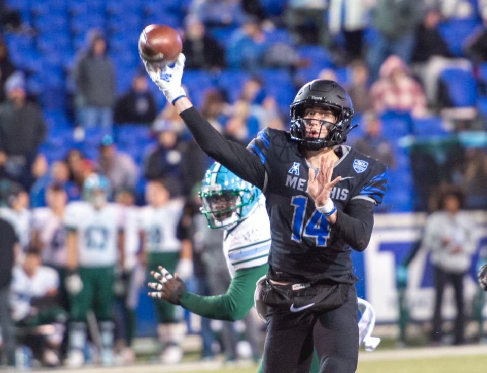<strong>Memphis freshman quarterback Seth Henigan passes in the contest with Tulane in the final regular season game Saturday, Nov. 27, 2021. Memphis held on to win 33-28.</strong> (Greg Campbell/Special to The Daily Memphian)