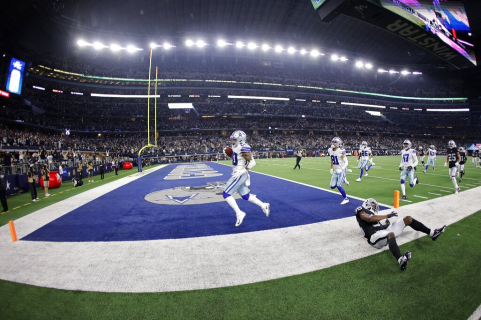 <strong>Dallas Cowboys running back Tony Pollard returns a kickoff for a touchdown after getting past Las Vegas Raiders defender Brandon Facyson, bottom right, in the second half of an NFL football game in Arlington, Texas, Thursday, Nov. 25, 2021.</strong> (AP Photo/Ron Jenkins)