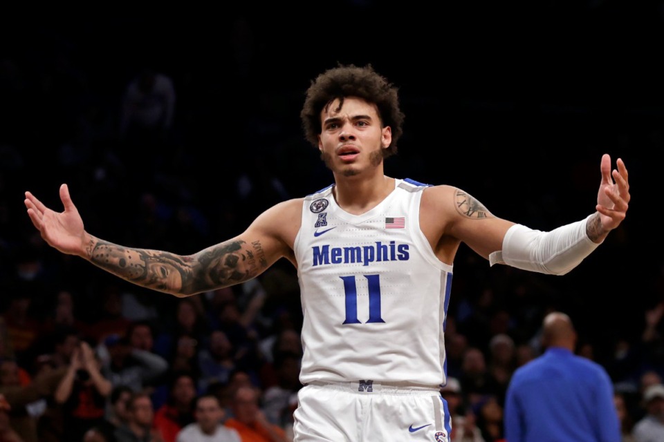 <strong>Memphis' Lester Quinones (11) reacts to a call during the first half of the team's NCAA college basketball game against Iowa State in the NIT Season Tip-Off tournament Friday, Nov. 26, 2021, in New York. Iowa State won 78-59.</strong> (AP Photo/Adam Hunger)
