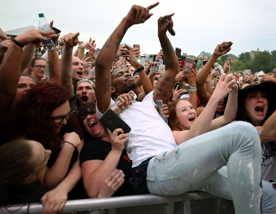 <strong>Memphis rapper BlocBoy JB dives into the crowd during the first day of the 2019 Beale Street Music Fest.</strong> (Patrick Lantrip/Daily Memphian)