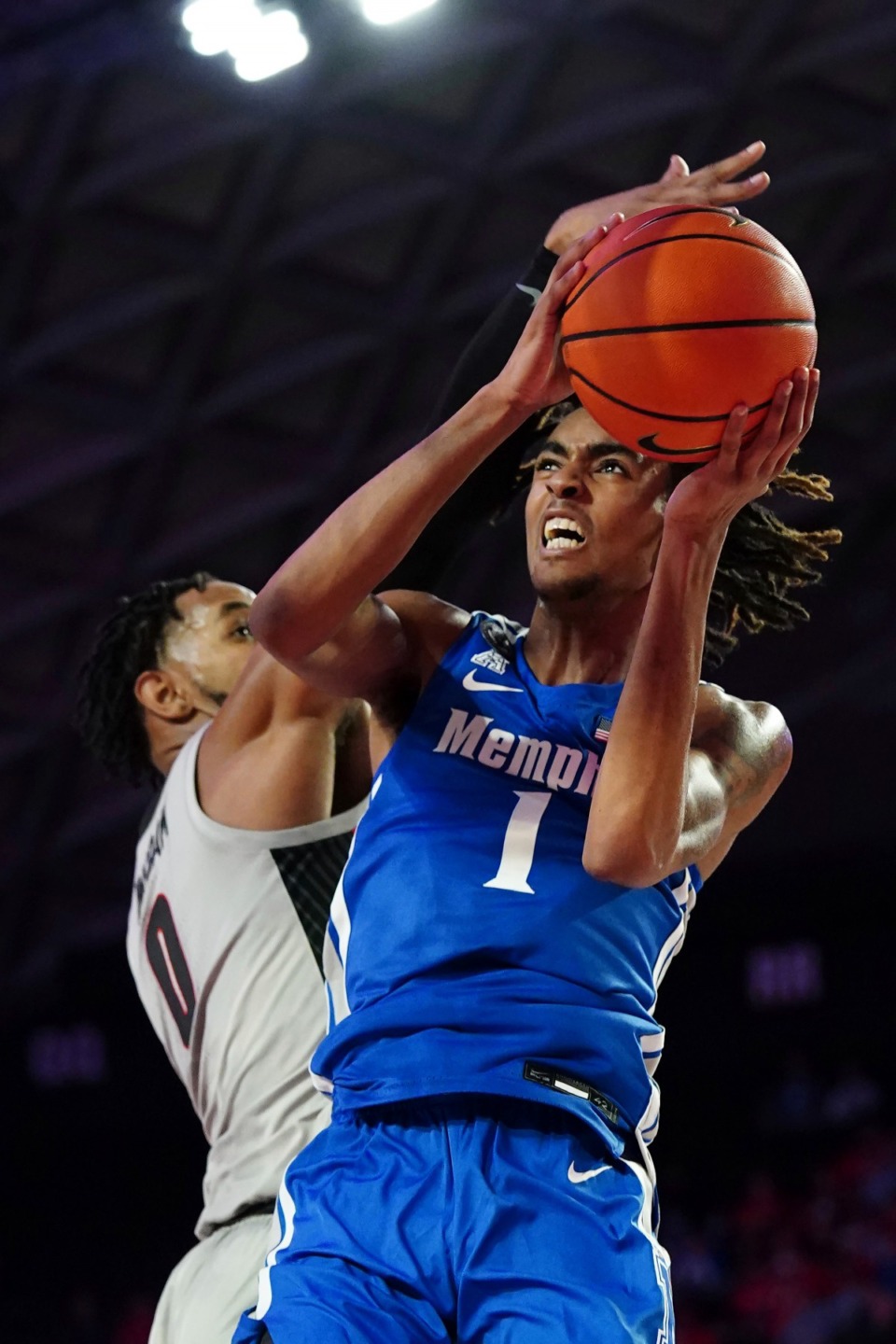 <strong>Memphis forward Emoni Bates goes up for a basket as Georgia forward Jailyn Ingram defends on Wednesday, Dec. 1, in Athens, Ga.</strong> (John Bazemore/Associated Press)