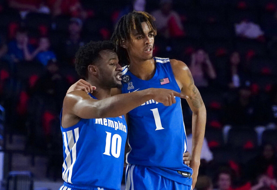 <strong>Memphis guard Alex Lomax (left) and forward Emoni Bates talk during a break in the action during the first half of their game against Georgia on Wednesday, Dec. 1, in Athens, Georgia.</strong> (John Bazemore/Associated Press)