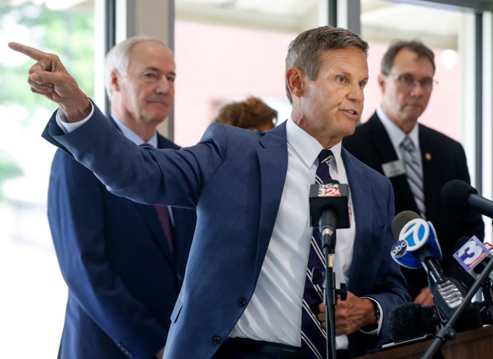 <strong>Gov. Bill Lee (middle) speaks at a press conference in Memphis on May 18. He has granted clemency to two people from Shelby County.</strong> (Mark Weber/The Daily Memphian file)