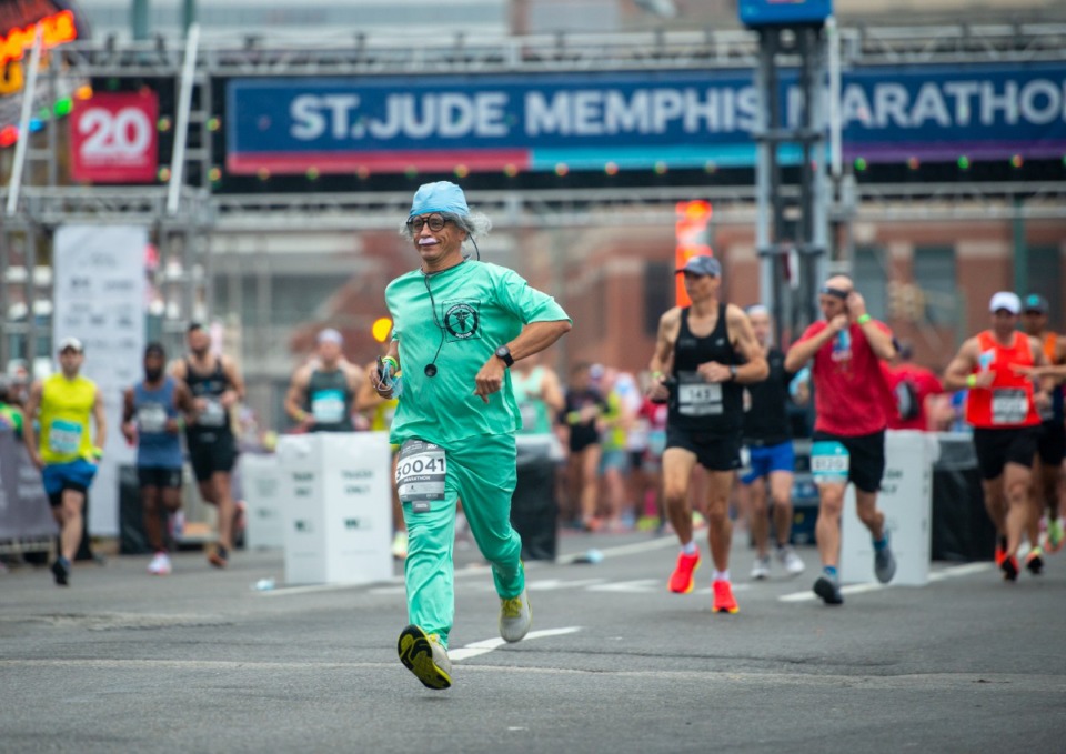 <strong>The "Professor" starts the 20th annual St. Jude Memphis Marathon with a nod to the healthcare workers Saturday, December 4, 2021.</strong> (Greg Campbell/Special for The Daily Memphian)