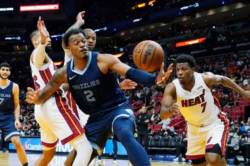 <strong>Grizzlies center Xavier Tillman Sr. (2) goes after a loose ball in the game against the Miami Heat&nbsp;on Dec. 6, 2021, in Miami.</strong> (Marta Lavandier/AP)