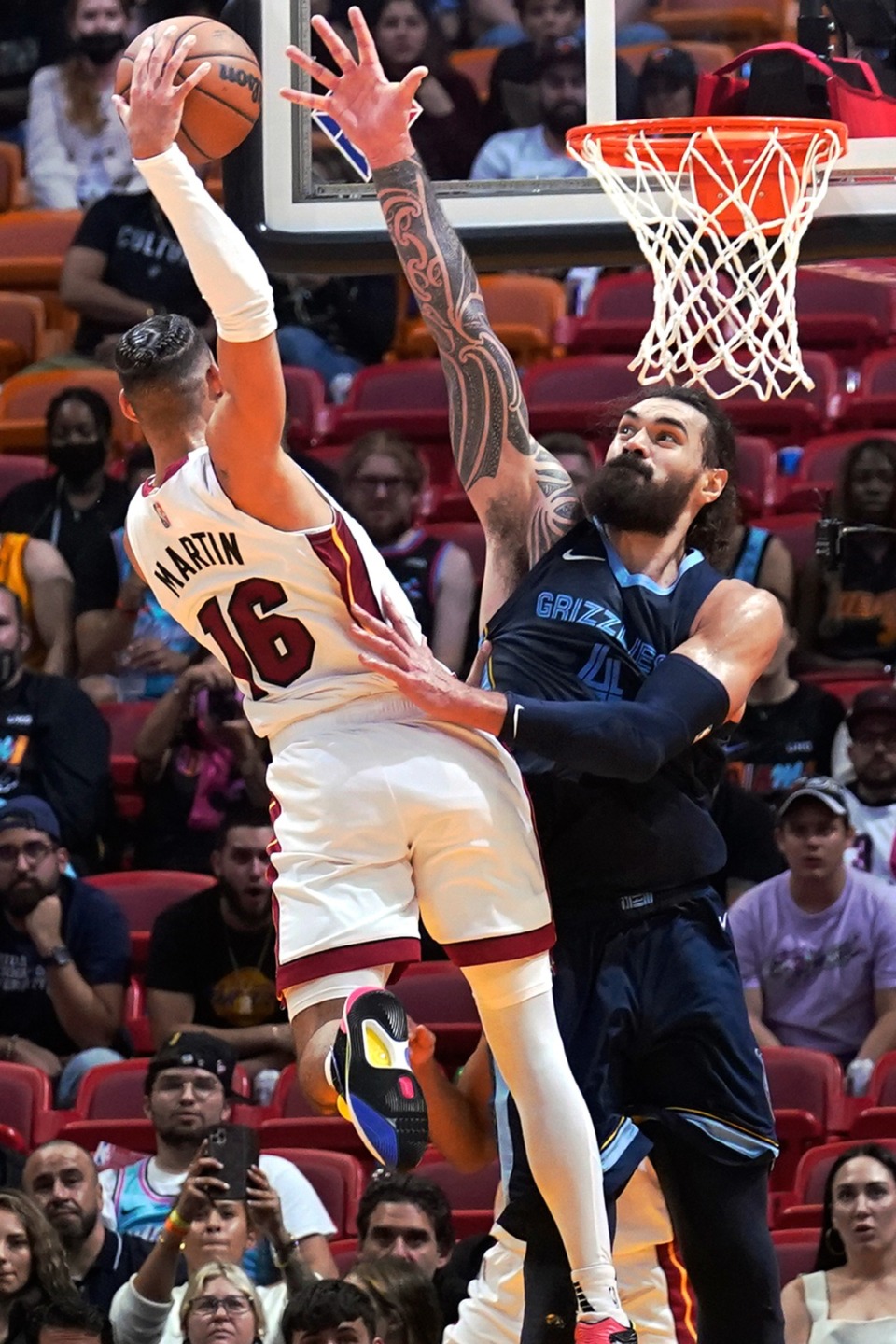 <strong>Grizzlies center Steven Adams (4) blocks Miami Heat forward Caleb Martin (16)</strong>&nbsp;<strong>on Dec. 6 in Miami.</strong> (Marta Lavandier/AP)