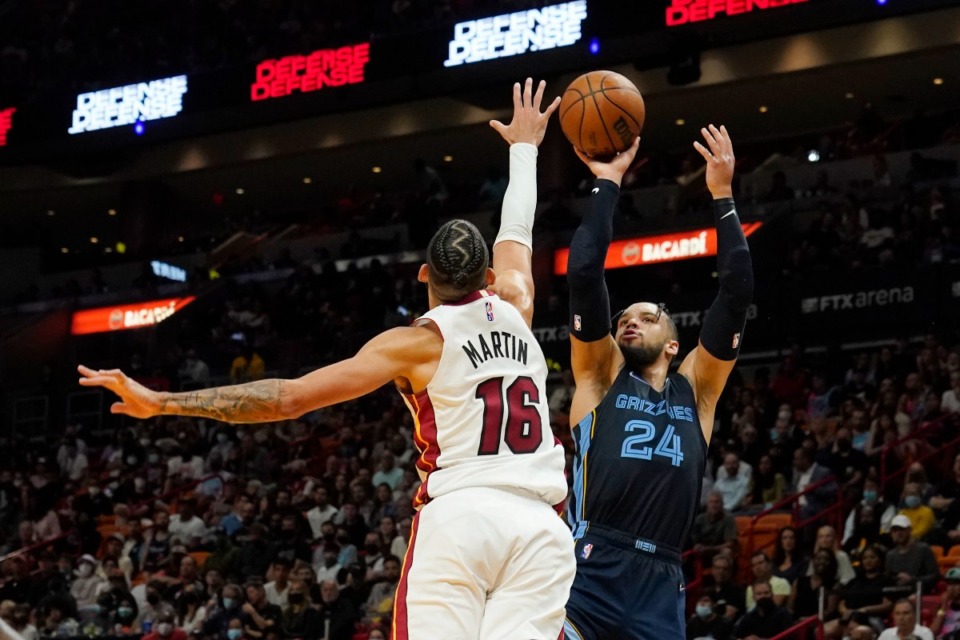 <strong>Grizzlies forward Dillon Brooks (24) shoots against Miami Heat forward Caleb Martin (16)&nbsp;on Dec. 6 in Miami.</strong> (Marta Lavandier/AP)