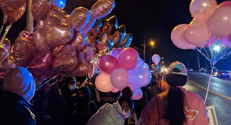 <strong>Family members and classmates of 15-year-old Phillexus Buchanan prepare to release balloons in her honor after she was fatally shot at a Whitehaven gas station on Friday, Dec. 3. She was one of two teens killed in the shooting that also injured a 9-month-old boy and his mother.</strong>&nbsp;(Yolanda Jones/Daily Memphian)