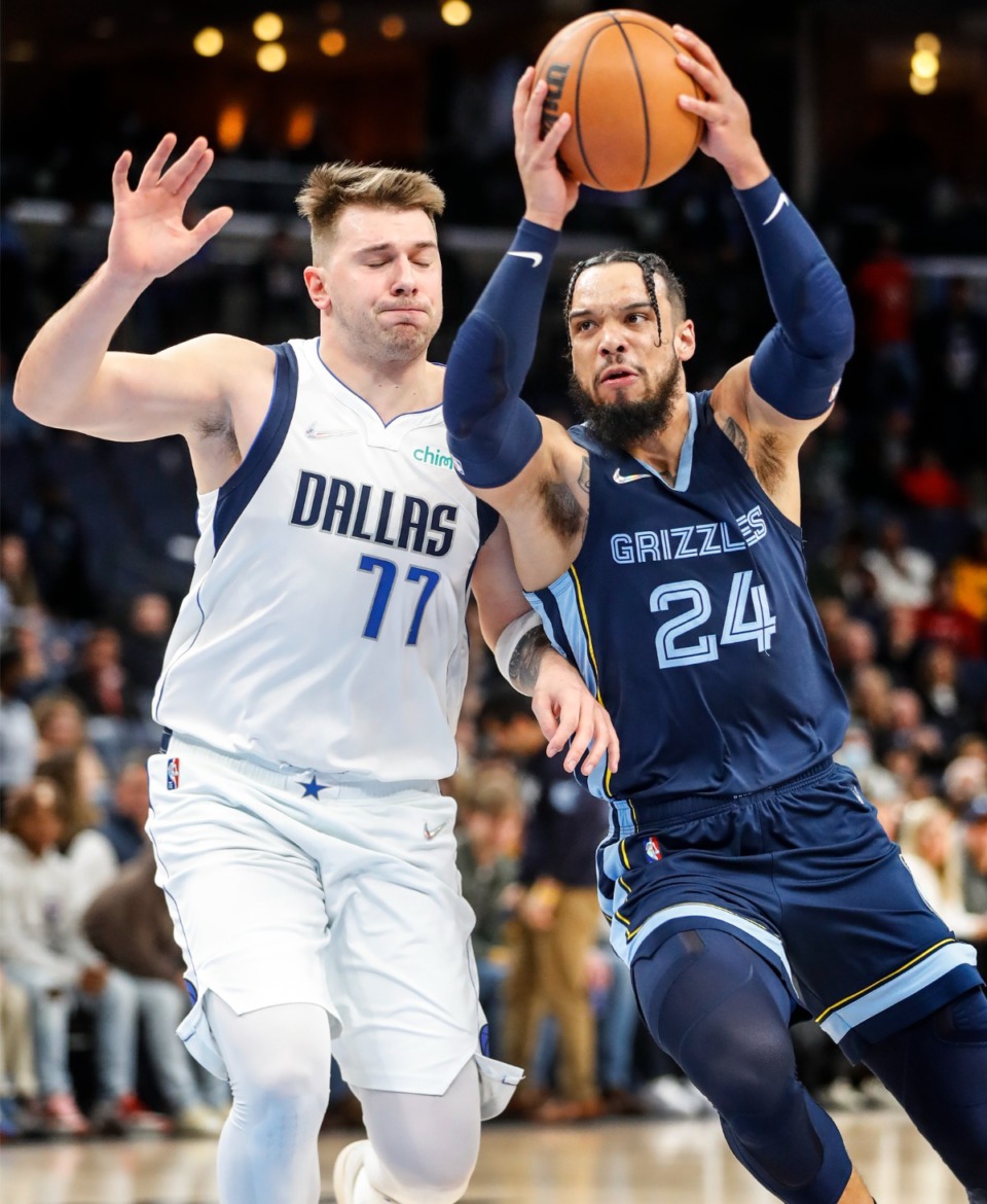 <strong>Grizzlies guard Dillion Brooks (right) drives the lane against Dallas Mavericks defender Luka Doncic (left) on Wednesday, Dec. 8, 2021.</strong> (Mark Weber/The Daily Memphian)