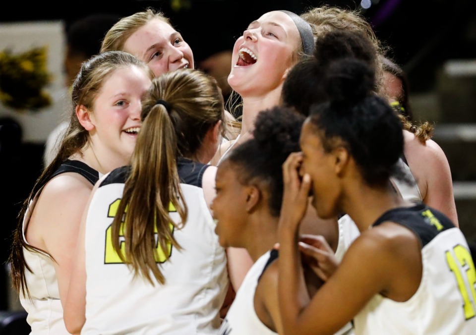 <strong>Hutchison guard Berklee Scifres (middle) celebrated with her teammates after defeating Knoxville Catholic&nbsp; during the Division II Class AA finals, March 6, 2021 in Cookeville. Scifres is the team&rsquo;s lone returning starter.</strong> (Mark Weber/The Daily Memphian)