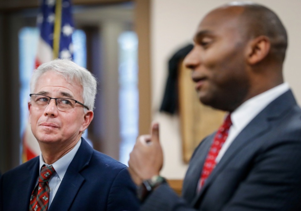 <strong>Former County Commissioner Steve Mulroy (left) listens as Shelby County Mayor Lee Harris (right) speaks during a press conference announcing Mulroy&rsquo;s candidacy for District Attorney General on Thursday, Dec. 9, 2021.</strong> (Mark Weber/The Daily Memphian)