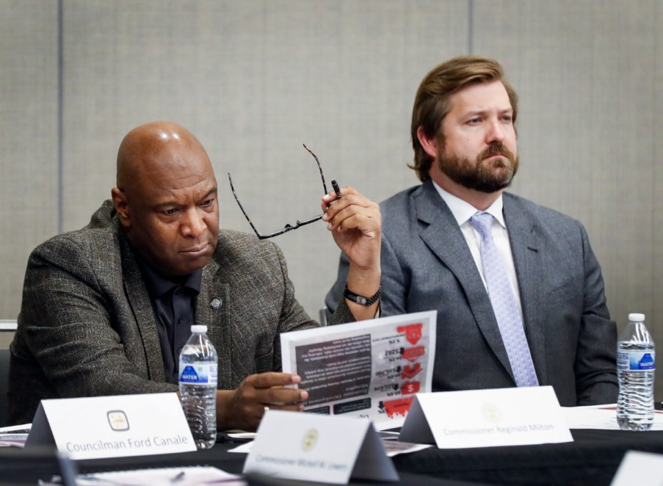 <strong>County Commissioner Reginald Milton (left) and City Councilman Chase Carlisle (right) attend a consolidation discussion on Thursday, Dec. 9, 2021 at the Renasant Convention Center.</strong> (Mark Weber/The Daily Memphian)