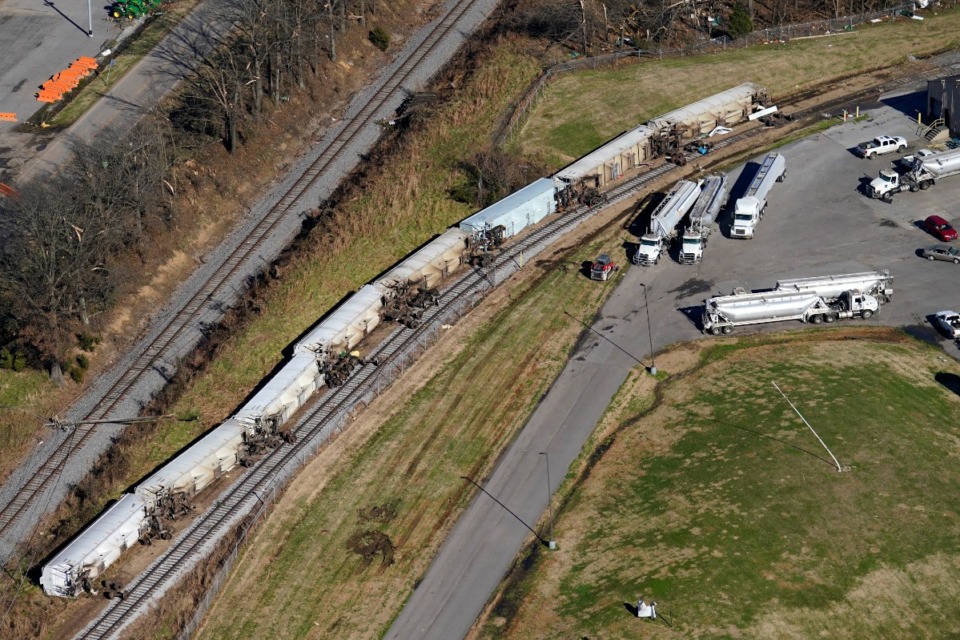 <strong>In this aerial photo, overturned train cars are seen Sunday, Dec. 12, 2021 in the aftermath of tornadoes that tore through the region near Mayfield, Ky., in the evening of Dec. 10 and early hours of Dec. 11.&nbsp;</strong>(AP Photo/Gerald Herbert)