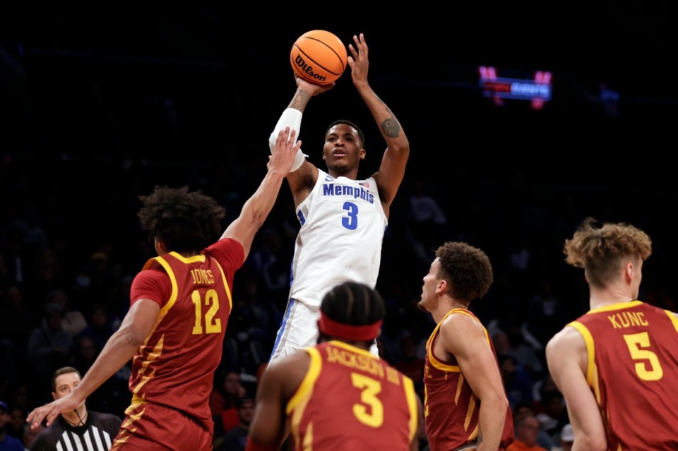 <strong>Memphis' Landers Nolley II (3) shoots over Iowa State's Robert Jones (12) during the second half of an NCAA college basketball game in the NIT Season Tip-Off tournament Friday, Nov. 26, 2021, in New York. Iowa State won 78-59.</strong> (AP Photo/Adam Hunger)