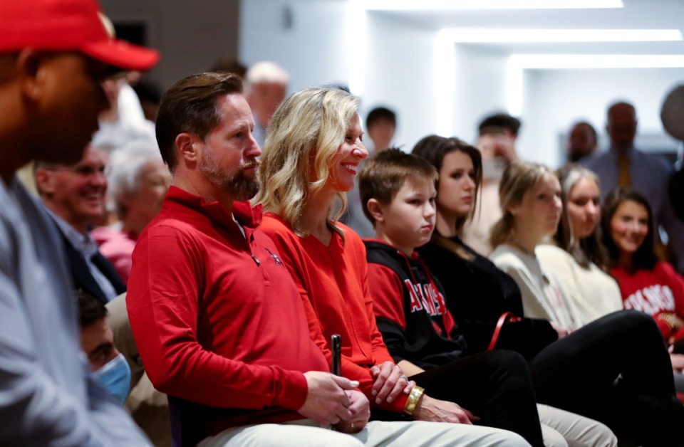 <strong>Patrick Kutas Sr. and his wife, Suzanne, watch as their son, University of Arkansas commit Patrick Kutas Jr., signs his letter of intent during a signing day event at Christian Brothers High School on Wednesday, Dec. 15.</strong> (Patrick Lantrip/Daily Memphian)