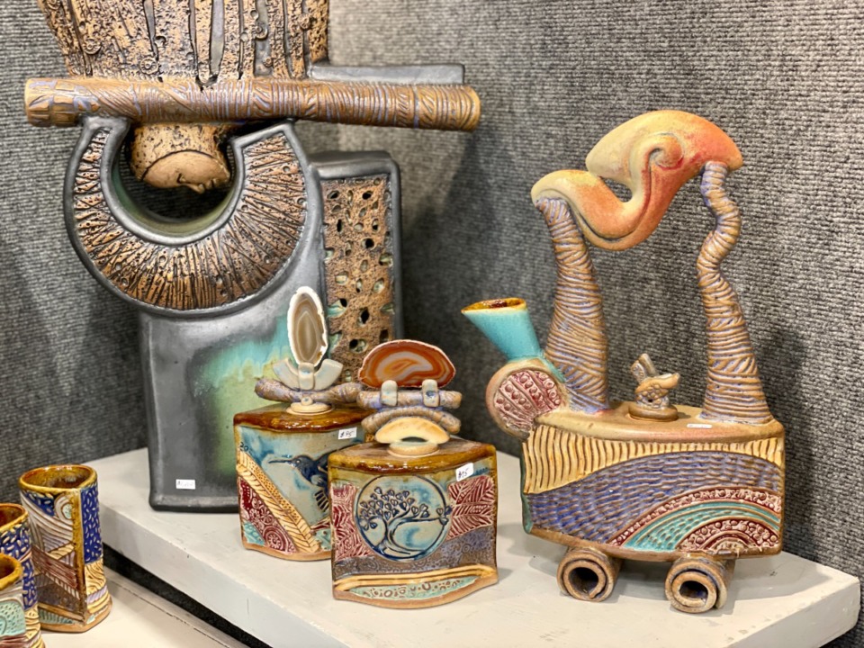<strong>Fanciful teapots and flasks by Bumble Bee Pottery at Winter Arts.</strong>&nbsp;(Jennifer Biggs/Daily Memphian)