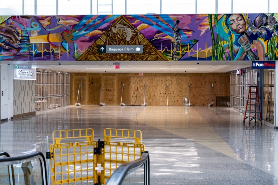 <strong>Lauren Kennedy, executive director of the UrbanArt Commission and an avid traveler, said that one thing that makes airports remarkable to her is the art in those spaces, particularly city-specific art. </strong>(Brad Vest/Special to The Daily Memphian)