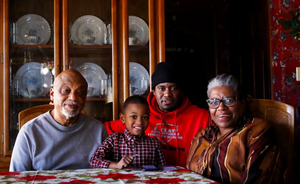 <strong>Whitman (left) and Gwen Able with their son, Eric, and grandson, Elijah, at their home Dec. 8.</strong> (Patrick Lantrip/Daily Memphian)