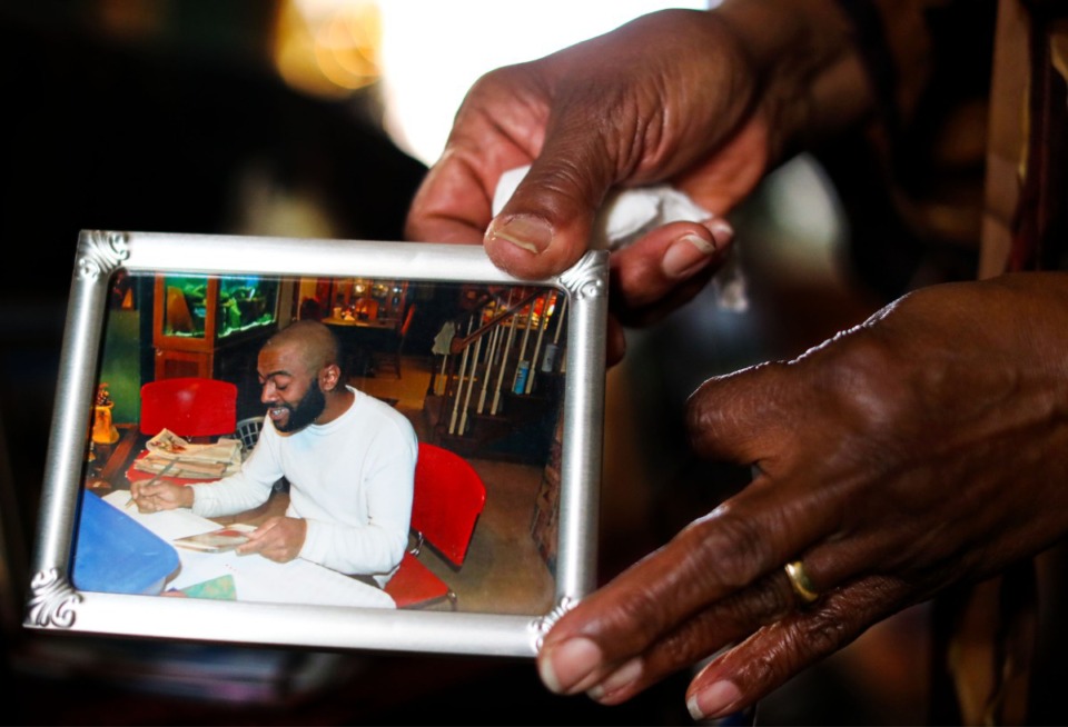 <strong>Gwen Able shows a picture of her son Anthony, who was shot to death on Oct. 12, while driving his car in North Memphis.</strong>&nbsp;(Patrick Lantrip/Daily Memphian)