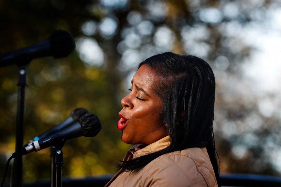 <strong>Opera Memphis singer Tanisha Ward performs to a small crowd from a flatbed trailer during an outdoor Collierville neighborhood performance on Monday, Dec. 21, 2020.</strong> (Mark Weber/The Daily Memphian file)
