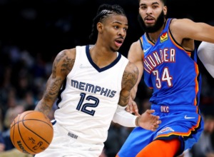 <strong>Memphis Grizzlies guard Ja Morant (12) brings the ball up the court during a Dec. 20, 2021 game against Oklahoma City.</strong> (Patrick Lantrip/Daily Memphian)