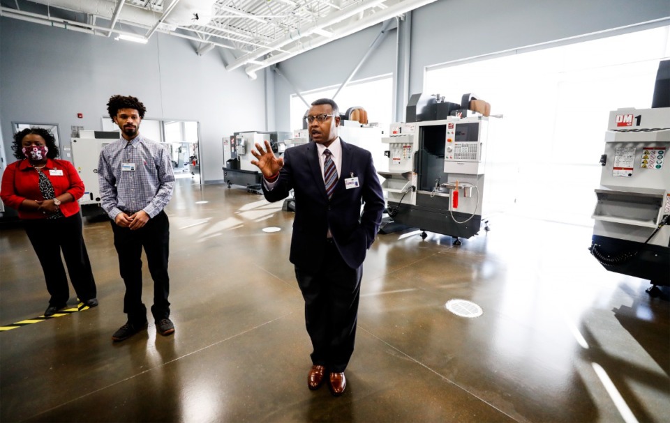 <strong>Tennessee College of Applied Technology President Roland Rayner (right) leads a tour of the new state-of-the-art workforce development training facility on Wednesday, Dec. 22, in Bartlett.&nbsp;&ldquo;To see the brick-and-mortar piece of this is complete and to have faculty in here and students coming in in January, I&rsquo;m really pleased with that,&rdquo; he said.</strong> (Mark Weber/Daily Memphian)