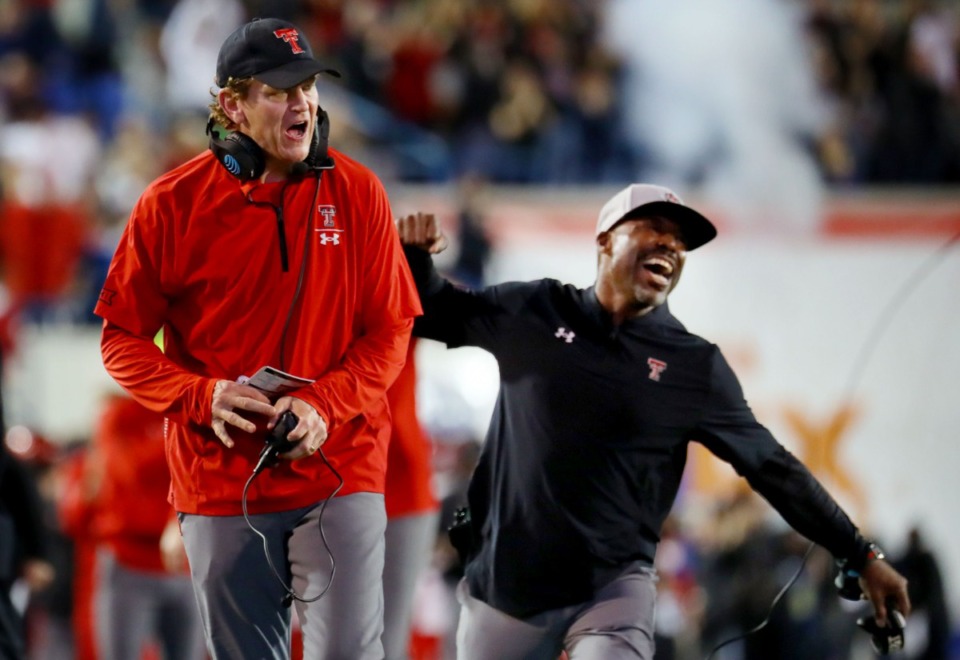 <strong>Texas Tech University coach Sonny Cumbie (left) celebrates his team&rsquo;s opening touchdown against Mississippi State during the 63rd AutoZone Liberty Bowl on Dec. 28, 2021.</strong> (Patrick Lantrip/Daily Memphian)