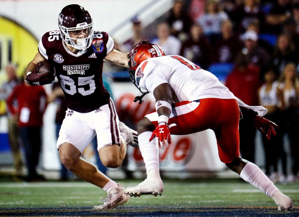 <strong>Mississippi State University receiver Austin Williams (85) fights off a Texas Tech defender during the 63rd AutoZone Liberty Bowl on Dec. 28, 2021.</strong> (Patrick Lantrip/Daily Memphian)
