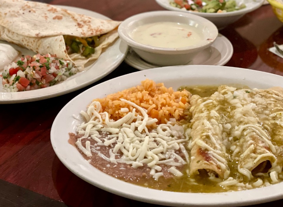<strong>Las Delicias enchiladas suiza meal is $9.15 and the big pork burrito (left) is $5.</strong> (Jennifer Biggs/Daily Memphian)
