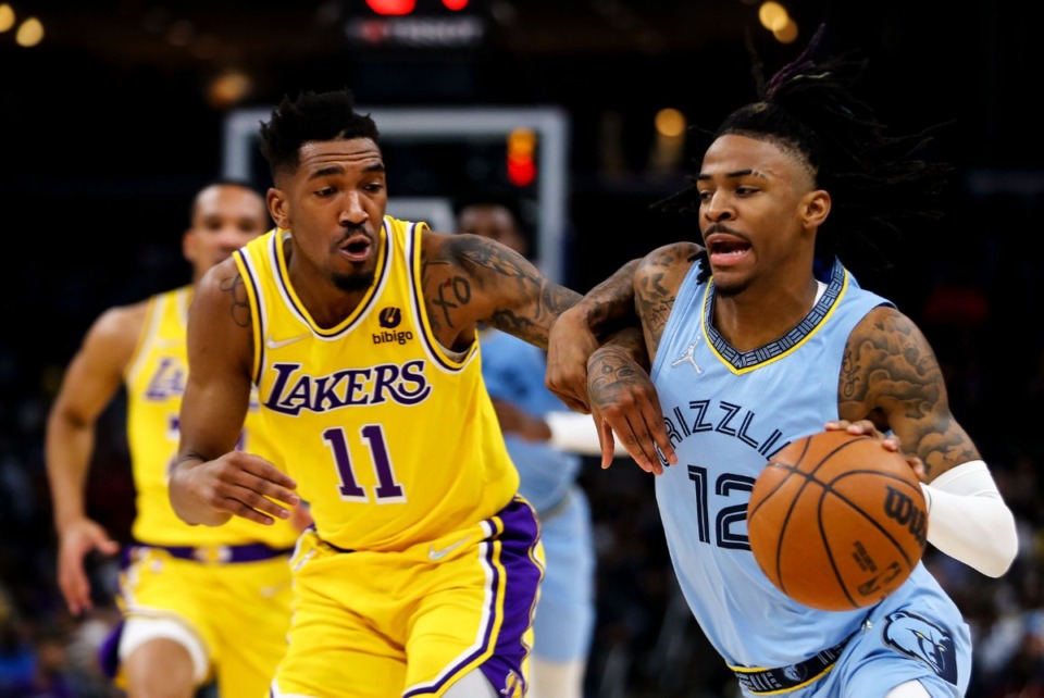 <strong>Grizzlies guard Ja Morant drives to the basket against the Los Angeles Lakers on Wednesday, Dec. 29, at FedExForum.</strong> (Patrick Lantrip/Daily Memphian)