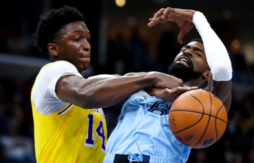 <strong>Grizzlies guard Shaq Buchanan (6) fights for a loose rebound on Dec. 29 in the game game against the Los Angeles Lakers at FedExForum.</strong> (Patrick Lantrip/Daily Memphian)