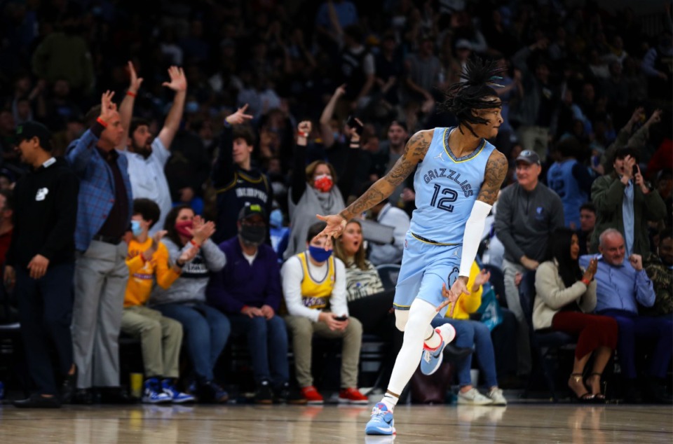 <strong>Memphis Grizzlies guard Ja Morant (12) celebrates after a huge three pointer during a Dec. 29, 2021 game against the Los Angeles Lakers at the FedExForum.</strong> (Patrick Lantrip/Daily Memphian)