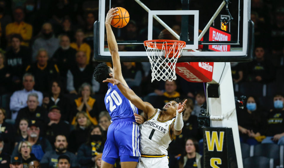 <strong>Josh Minott (20) had a big game off the bench and the</strong> <strong>Memphis Tigers welcomed back DeAndre Williams and Jalen Duren into the starting lineup against Wichita State on Saturday. The Tigers rolled to an 82-64 victory. (</strong>Travis Heying/Wichita Eagle)