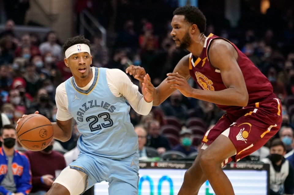 <strong>Grizzlies guard Jarrett Culver (23) drives against Cleveland&rsquo;s Evan Mobley (4) on Jan. 4, 2022, in Cleveland.</strong> (Tony Dejak/AP)