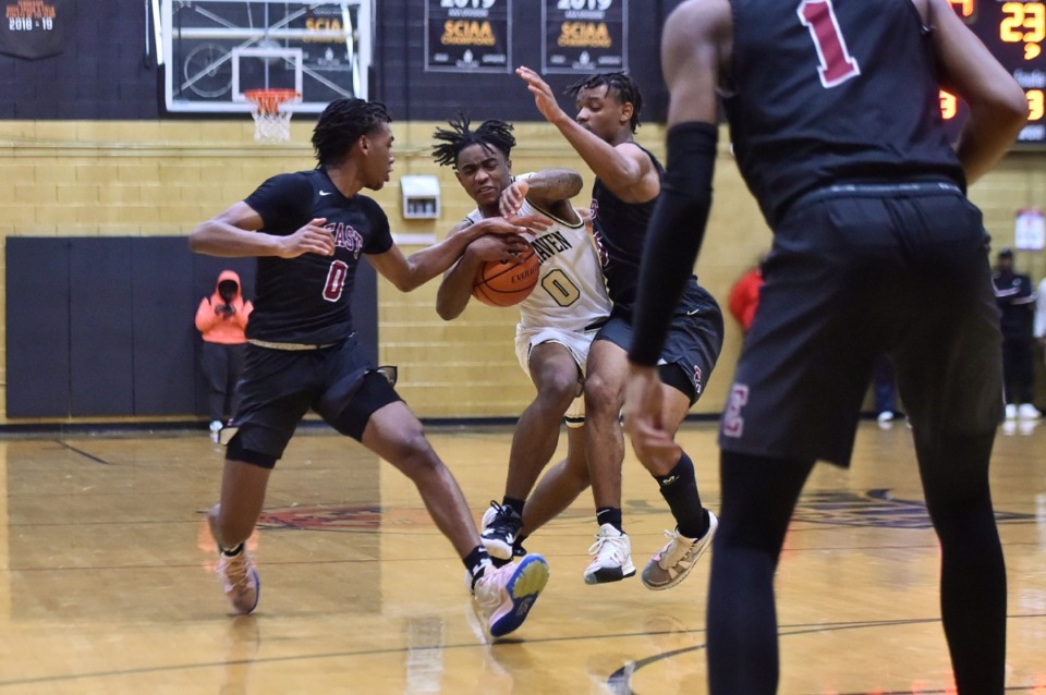 <strong>Whitehaven&rsquo;s Ladricus Pittman (0) drives the lane against Whitehaven&rsquo;s E.J. Smith (0)</strong>&nbsp;<strong>on Jan 4, 2022.</strong> (Justin Ford/Special to The Daily Memphian)