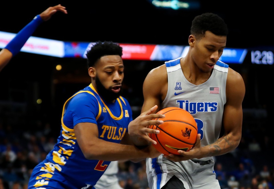 <strong>University of Memphis guard Landers Nolley II (3) fights for a rebound against the University of Tulsa at FedExForum on Jan. 4, 2022.</strong> (Patrick Lantrip/Daily Memphian)
