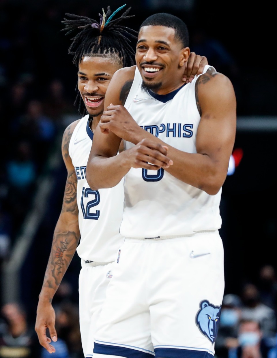 <strong>Grizzlies guard Ja Morant (left) jokes with teammate De'Anthony Melton (right) in the game against Detroit on Thursday, Jan. 6, 2022.</strong> (Mark Weber/The Daily Memphian)