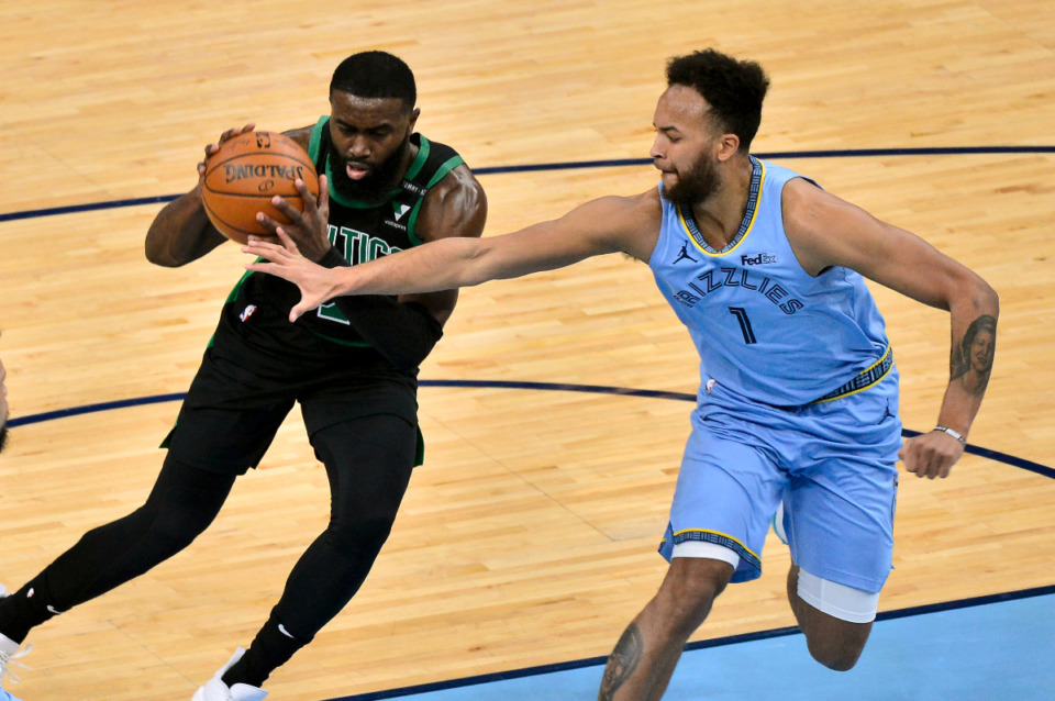 <strong>Boston Celtics guard Jaylen Brown, left, is one name that keeps coming up in trade rumors with the Grizzlies. But, would you make that deal? </strong>(AP Photo file/Brandon Dill)