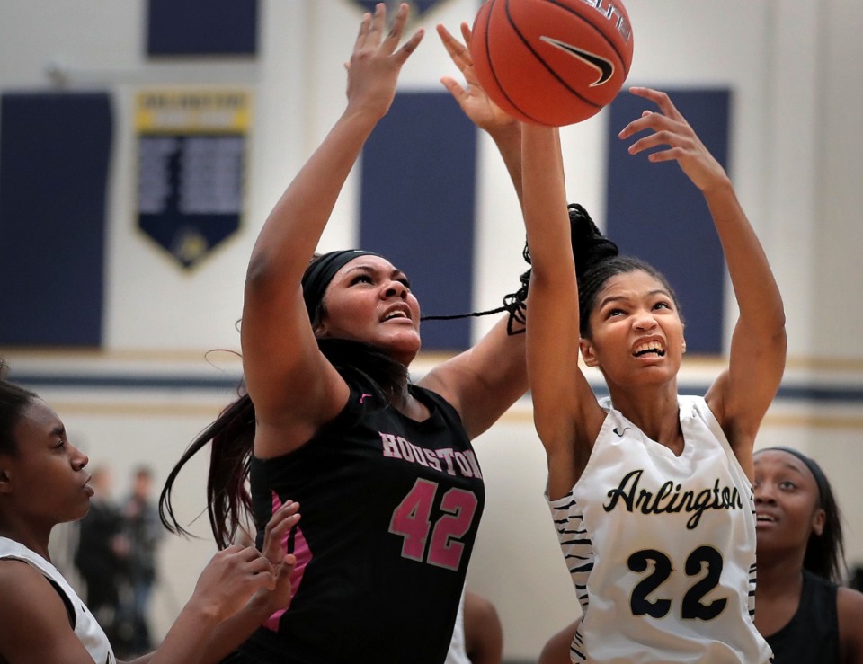 <strong>Lady Mustangs&rsquo; Mallory Collier (42) battles for a rebound with the Tigers' Taylor Dupree during a game in January 2020 at Arlington High School.</strong> (Jim Weber/Daily Memphian file)