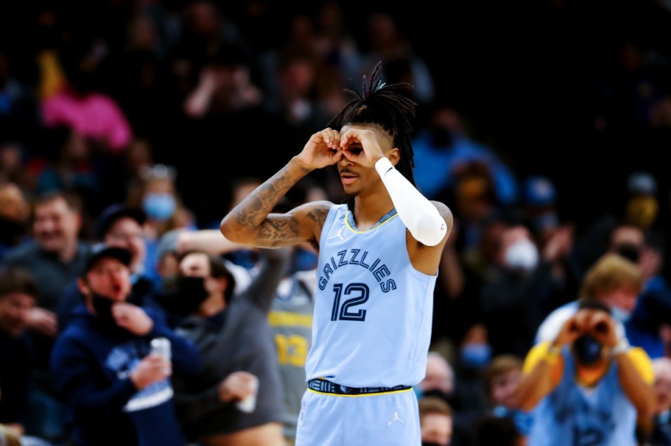 <strong>Grizzlies guard Ja Morant (12) celebrates after an assist during the Jan. 11 game against the Golden State Warriors at FedExForum.</strong> (Patrick Lantrip/Daily Memphian)
