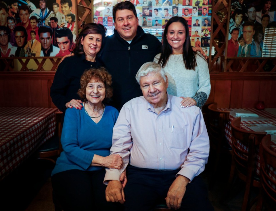 <strong>Coletta&rsquo;s Italian Restaurant owners Diane and Jerry Coletta (front) and their children (back, from left) Lisa Coletta, Stephen Coletta and Kristina Holland are shown in the South Parkway location&rsquo;s dining room on Nov. 2, 2020.</strong> (Mark Weber/Daily Memphian file)