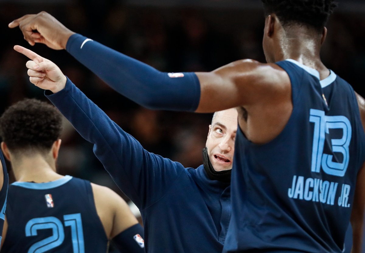 <strong>Grizzlies assistant coach Darko Rajakovic (middle) instructs center Jaren Jackson Jr. during the game against the Minnesota Timberwolves on Thursday, Jan. 13, 2022. &ldquo;The last time we played this team they punked us,&rdquo; he said. &ldquo;We just want to go out there and try to get even.&rdquo;</strong> (Mark Weber/The Daily Memphian)