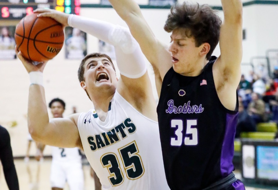 <strong>Briarcrest forward Wesley Davis (left) drives to the basket against CBHS&rsquo; Michael Pepper (right) on Friday, Jan. 14, 2022.</strong> (Mark Weber/The Daily Memphian)