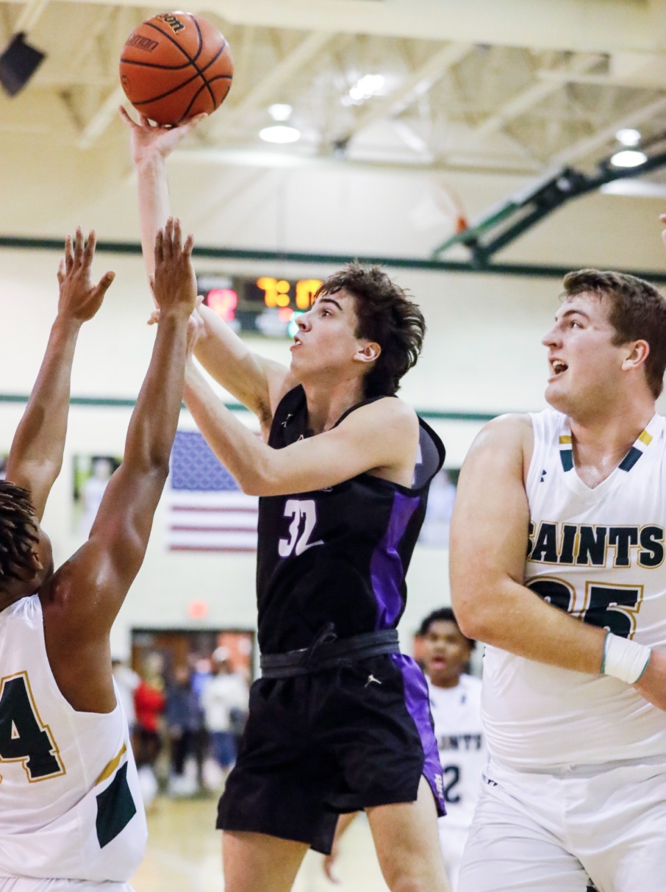 <strong>CBHS forward Hunter Pratt (middle) drives to the basket against Briarcrest&rsquo;s Wesley Davis (right) on Friday, Jan. 14, 2022.</strong> (Mark Weber/The Daily Memphian)