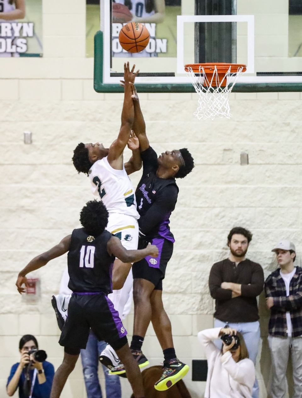 <strong>A CBHS defender (right) fouls Briarcrest guard Bryson Nash (left) on Friday, Jan. 14, 2022.</strong> (Mark Weber/The Daily Memphian)