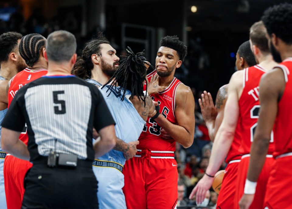<strong>Memphis Grizzlies guard Ja Morant (middle left) gets into a shoving match with Chicago Bulls defender Tony Bradley (right) during action on Monday, Jan. 17, 2022.</strong> (Mark Weber/The Daily Memphian)