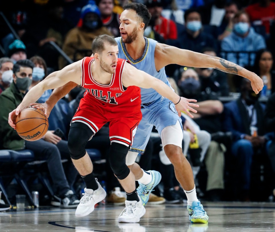 <strong>Memphis Grizzlies defender Kyle Anderson (back) steals the ball away from Chicago Bulls guard Matt Thomas (front) during action on Monday, Jan. 17, 2022.</strong> (Mark Weber/The Daily Memphian)